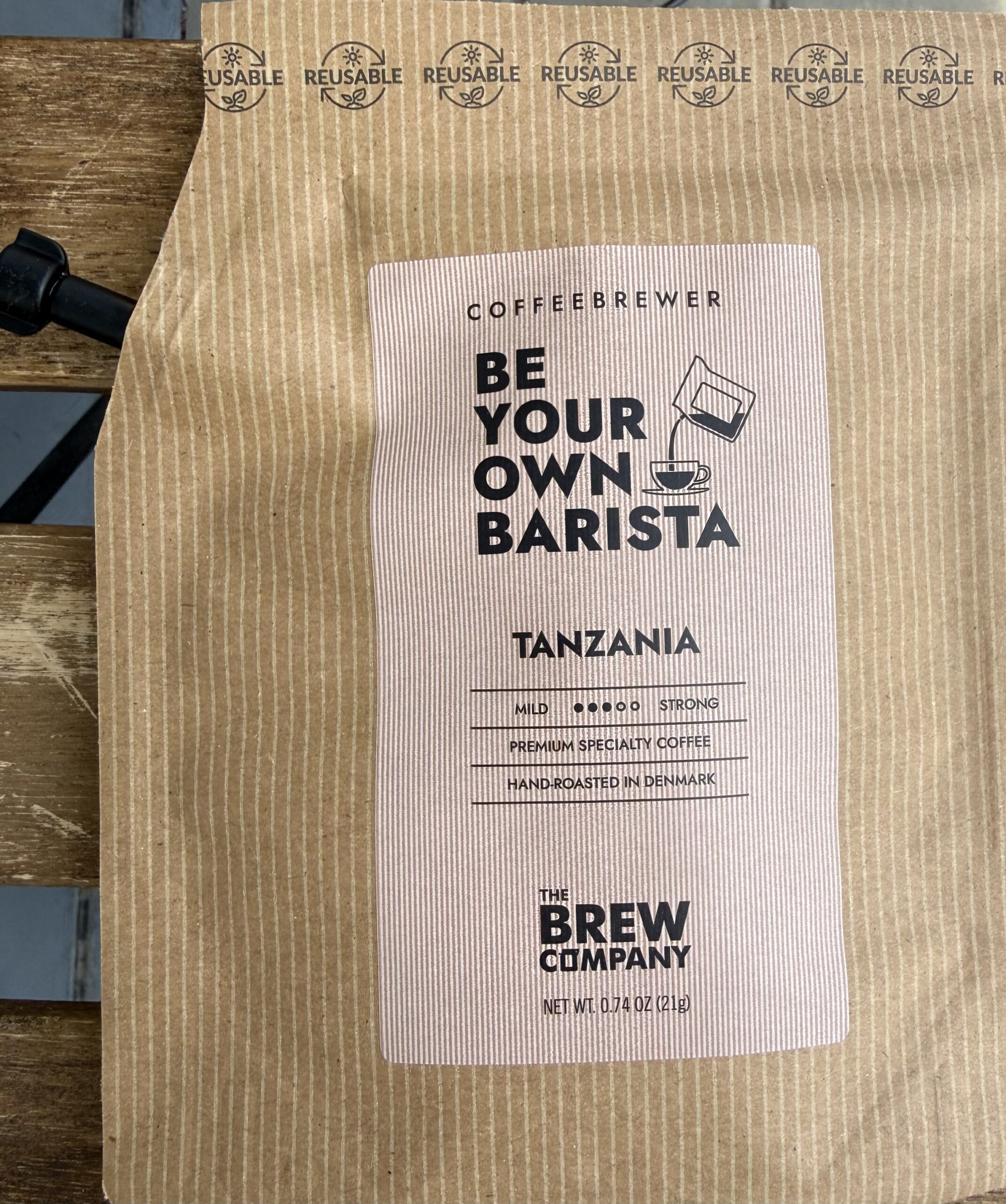 Opakowanie kawy speciality z Tanzanii marki The Brew Company, jednoporcjowa torebka brew-in-the-bag, 21 g